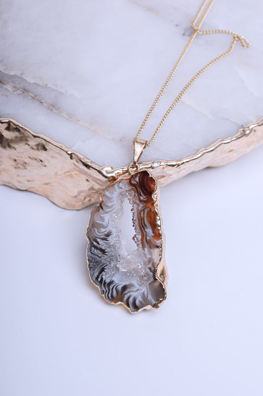 Agate pendant in natural shades with crystal formations